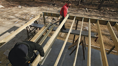 deck ledger brackets, flexible flashing, and a joist-hanger jig