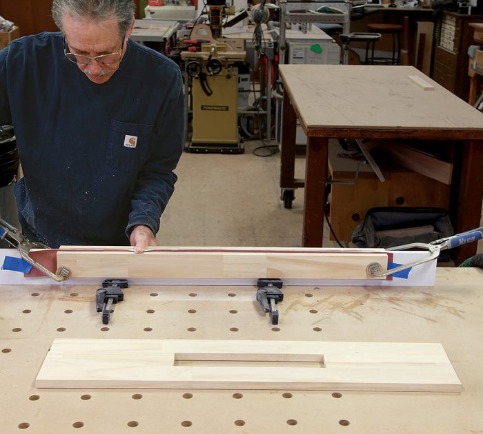 clamp to a piece of the casing wrapped in rosin paper