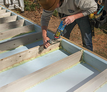 thick rigid foam in each joist bay and along the rim joists, and sealed the perimeter of the strips with spray foam