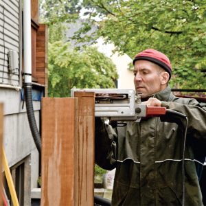 5. Cut all the posts to the same height. For reference, sight down the line of posts to check that they are all the same height.