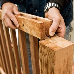 18. Slide the balustrades down into position so that all four blocks are hidden behind the rails.