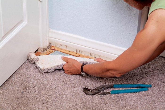 Grab a corner of the carpeting with pliers to start your removal.