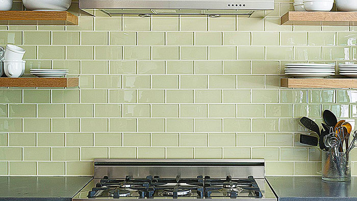 green glass tile backsplash